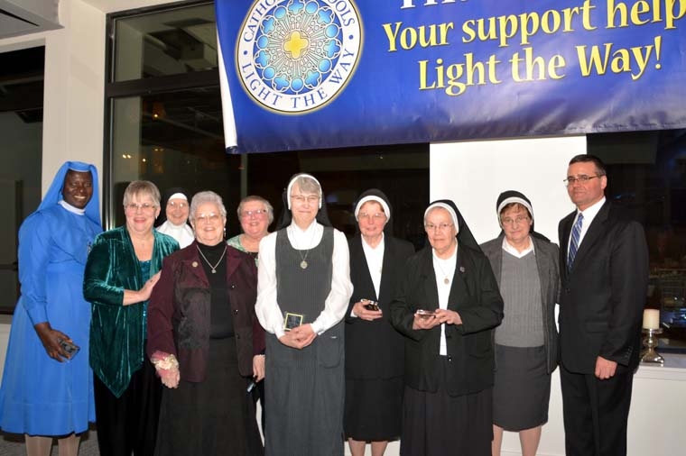 Angels honored at Catholic Schools dinner