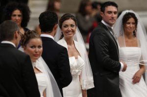 20150831cnsbr0286 1 300x199 - Couples react after exchanging vows in 2014 at Vatican