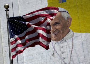 20150915cnsto0001 1 300x214 - U.S. flag flies in front of Pope Francis mural in New York City