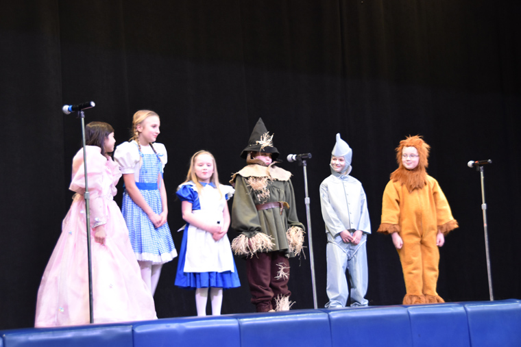 Members of Blessed Sacrament School’s cast of “Dorothy in Wonderland” sings “Will We Ever See Home Again?”