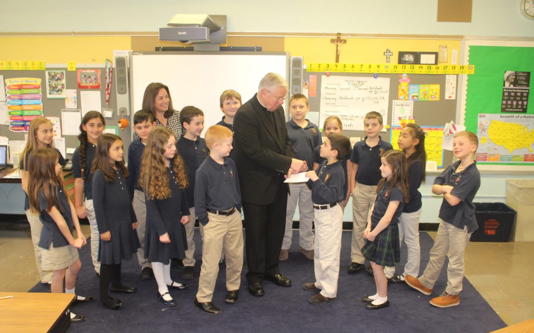 Holy Cross class makes donation to Cathedral Restoration Fund