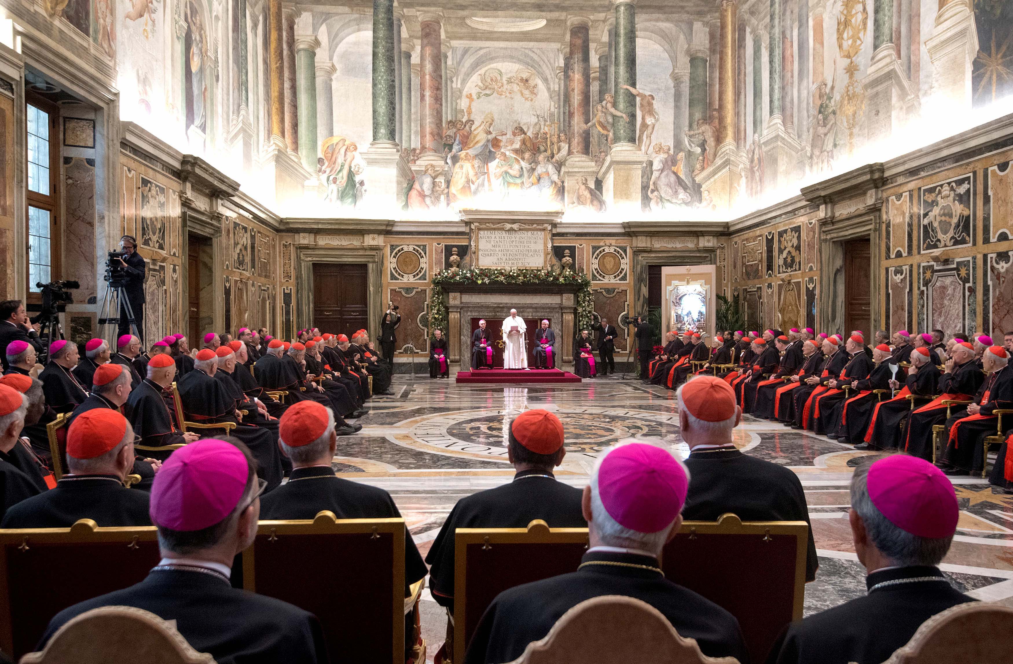 Church will spare no effort to end abuse, pope tells Curia
