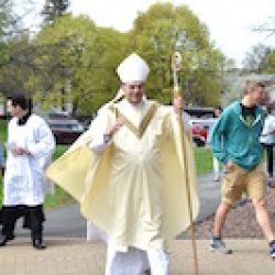 Bishop Robert J. Cunningham arrives for Our Lady of Lourdes Parish's 100th anniversary Mass May 5, 2019. (Sun photo | Katherine Long)