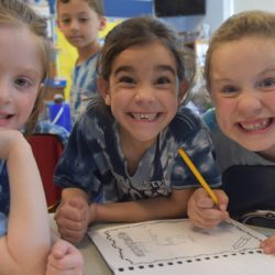 Kindergarteners from Immaculate Conception School in Fayetteville Gianna Oliva, Monica Fallon, and Myah Keenan smile on Spirit Day June 17. - Photo courtesy Caroline N. Agor-Calimlim