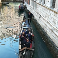 Pilgrims enjoy a gondola ride through the canals of Venice. (Photo provided)